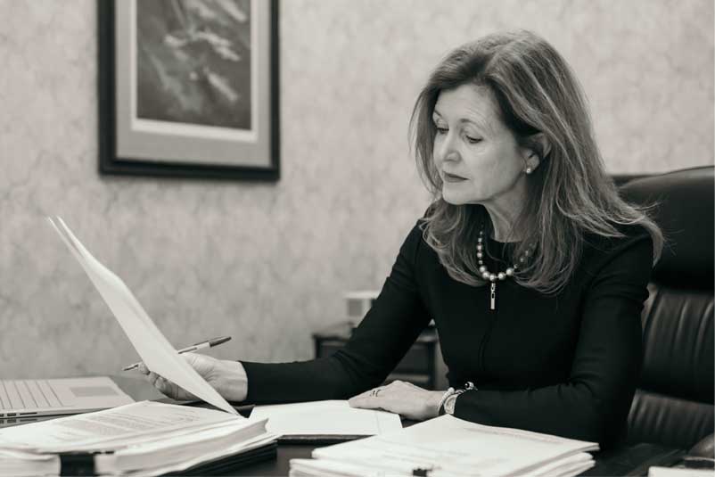 Patricia Lynn-Ford at her desk